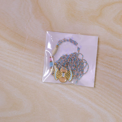 Fan Petal Kundan Pendant Rakhi with Pastel Beads