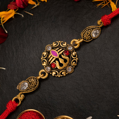 Premium Rakhi showcasing Ornate Floral Medallion, gold trims and gift style for Gift