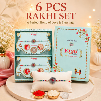 Sunburst Stone Rakhi with Magenta Centre, Pearl Beads, Roli Chawal Coin and Card Packing