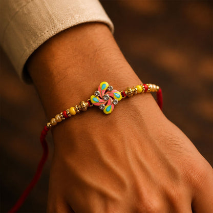 Meenakari Pinwheel Floral Crystal Stone Rakhi for Brother (10pcs)
