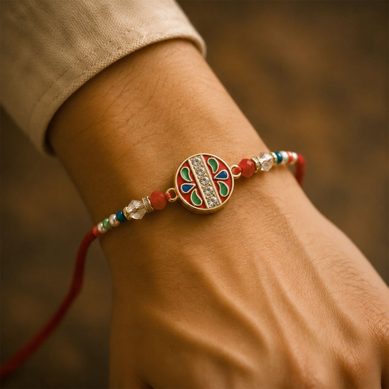 Round Red Green Enamel Rakhi with Multicolor Beads, Roli Chawal Coin and Card Packing