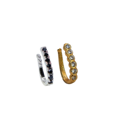 Close-up of adjustable gold tone clip-on nose pin with black cubic zirconia stones