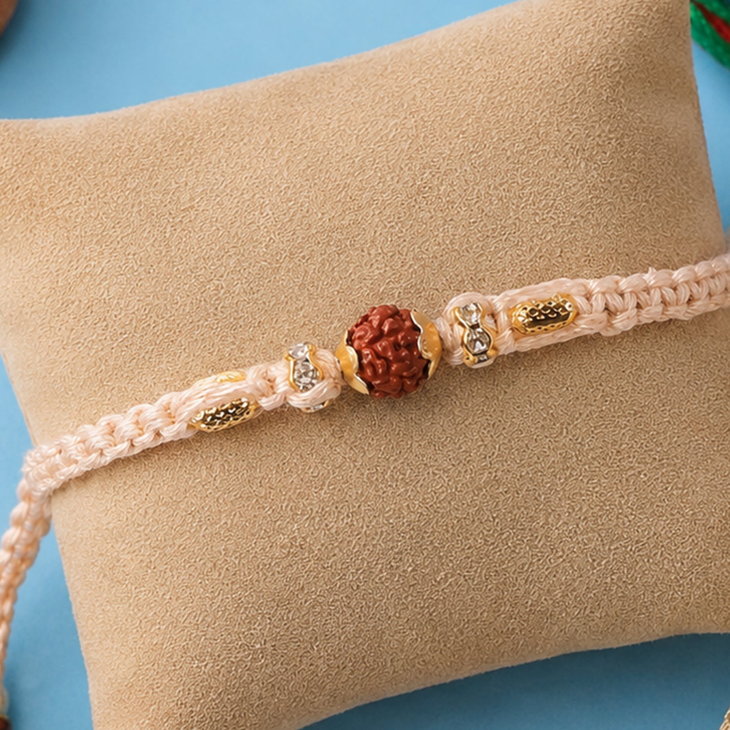 Beautiful Silver Style Rakhi with Soft Beads, Stone Detail and Premium Festive Look