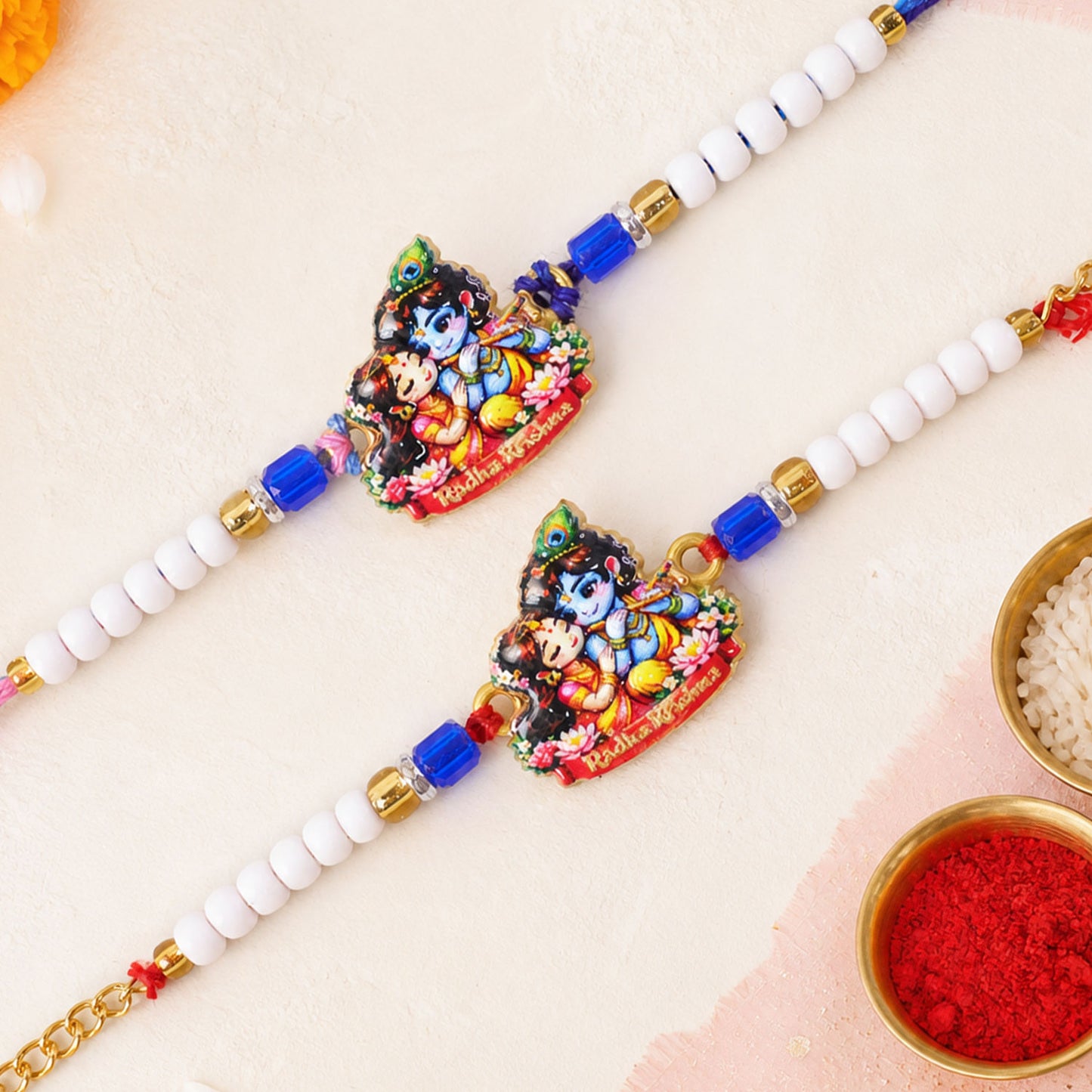 Radha Krishna Cartoon Printed Pearl Beads Bhai Bhabhi Rakhi Set