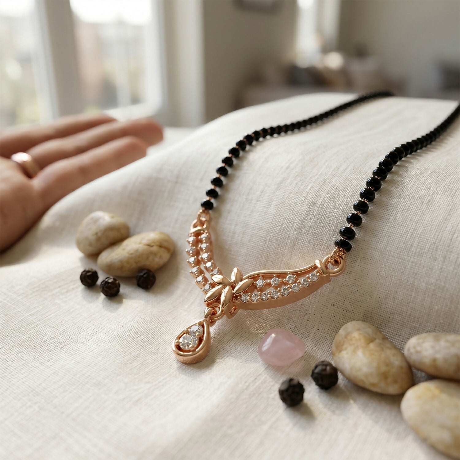 Jewellery showcasing an elegant mangalsutra with a decorative pendant