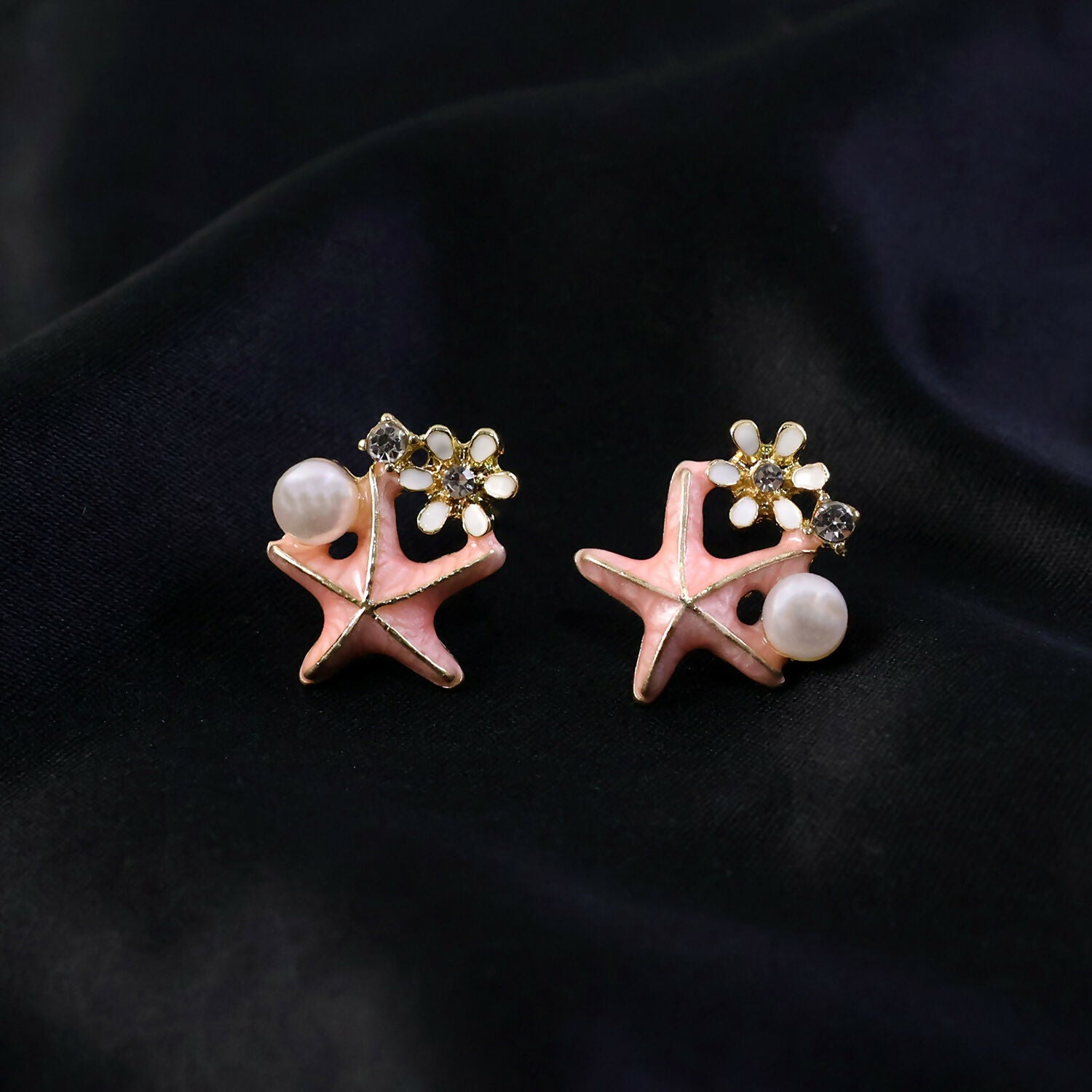 Pink enamel and crystal floral detailing on earrings