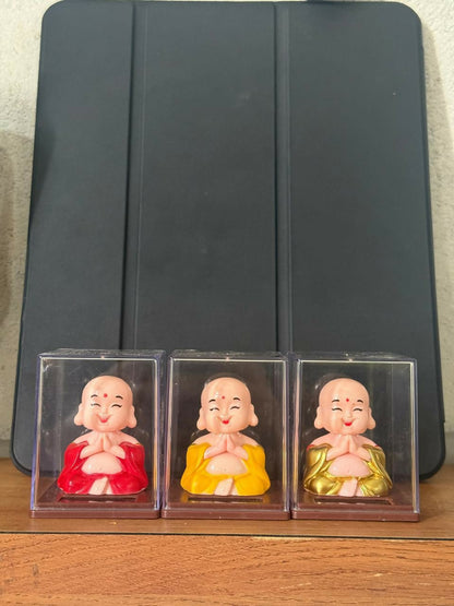 Solar Laughing Monk Bobble Head with Moving Head Display Case (Color may vary)