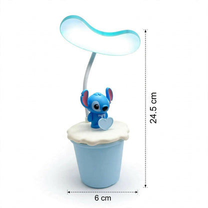The blue Stitch desk lamp with white dimension lines indicating its height of 24.5 cm and base width of 6 cm.