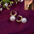 Pearl Huggie Hoop Earrings – Rose-Tinted Gold Plated Design