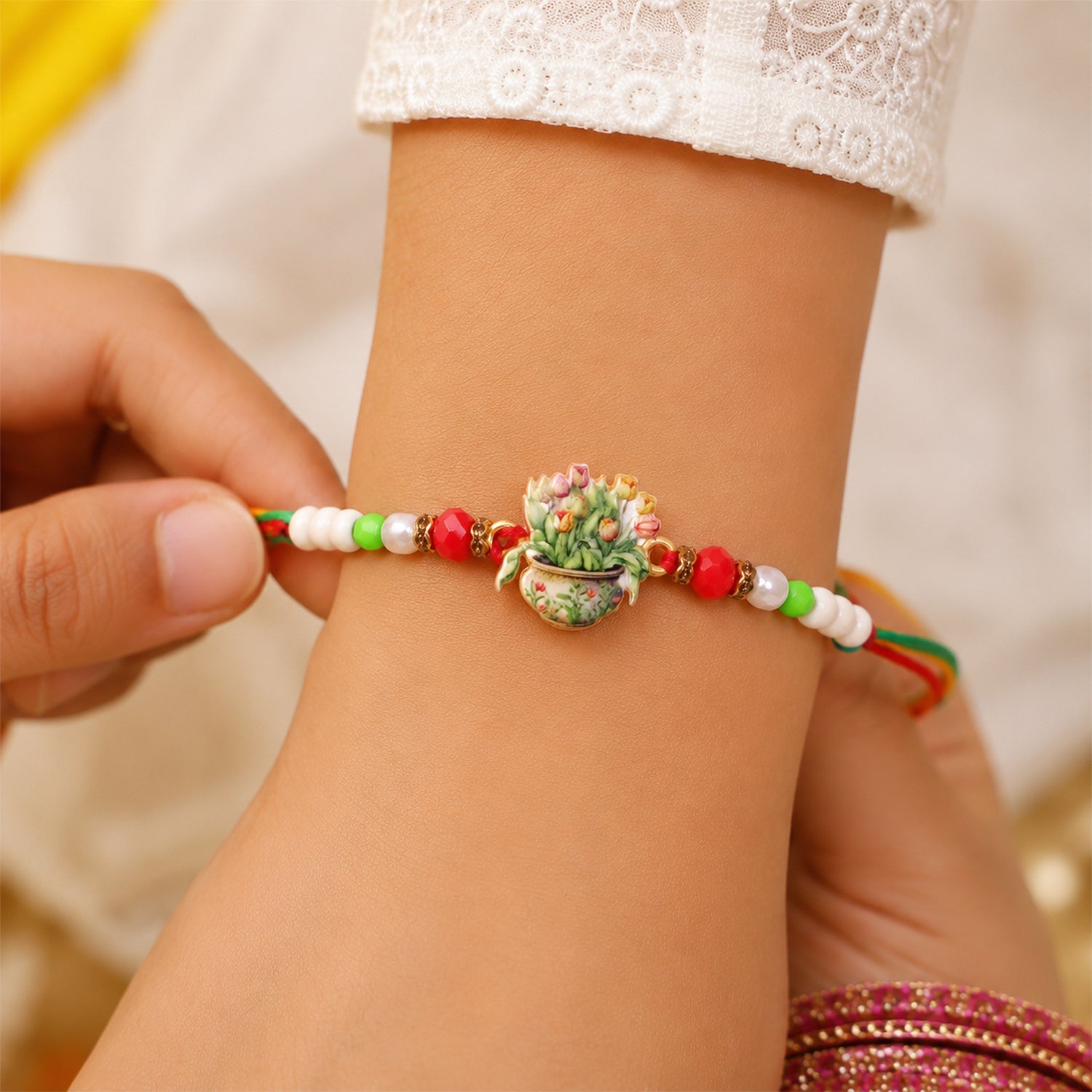 Auspicious Floral Kalash Devotional Rakhi for Brother with Beads Gift