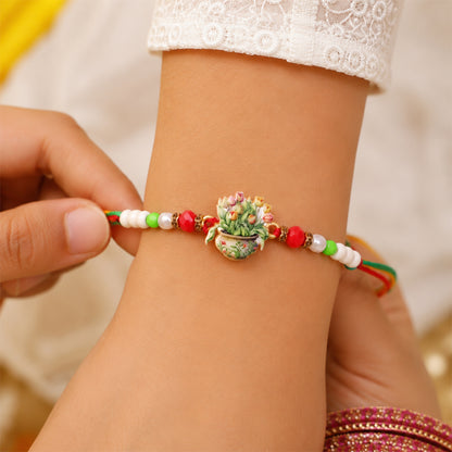 Auspicious Floral Kalash Devotional Rakhi for Brother with Beads Gift