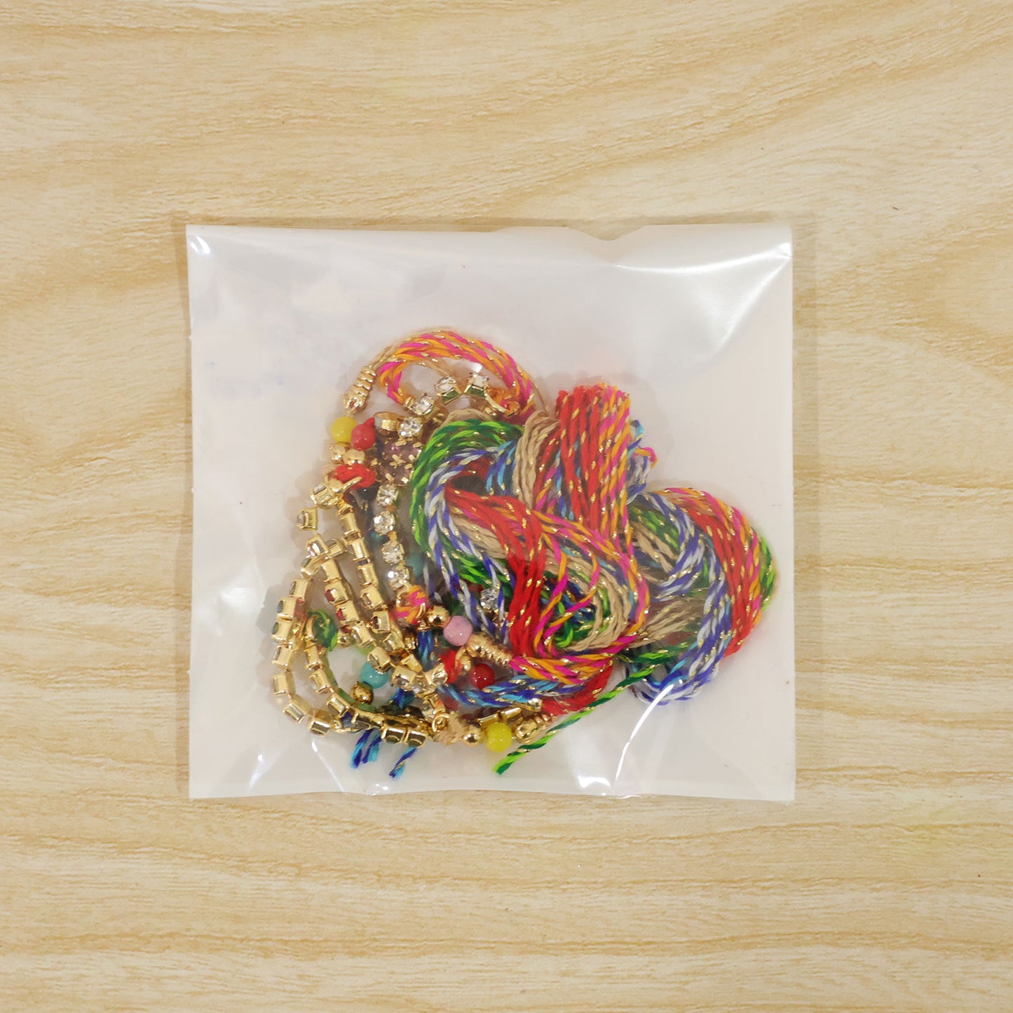 Square Motif Stone Band Rakhi in Mix Colour Threads (Pack of 6)