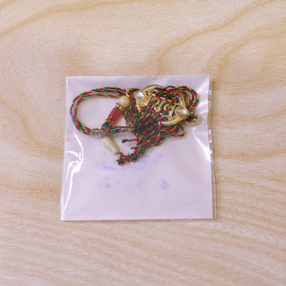Shiv Text Pendant Rakhi with Purple Enamel and Kundan Stones