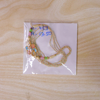 Ornate Rakhi featuring Petal Blossom Charm and bead line in gift style for Gift Use
