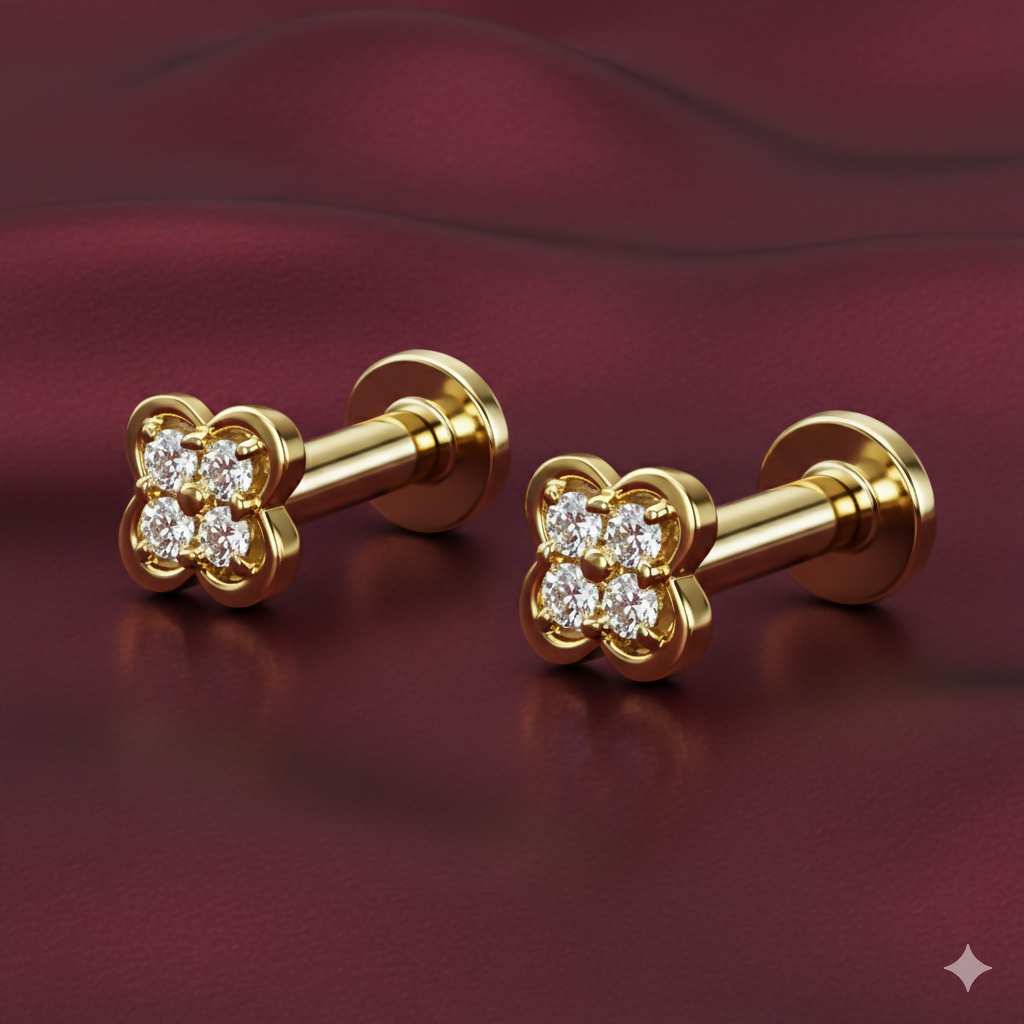 Close-up of gold plated four-leaf clover diamond stud earring design