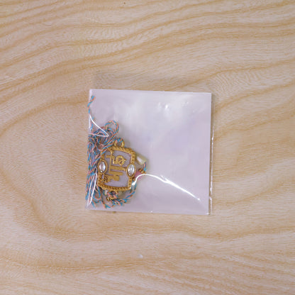 Bhai Script Pendant Rakhi with Lilac Stone and Kundan Accents