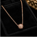Gold-Tone Floral Cluster Pendant Necklace with Clear Stone Accents and Delicate Chain