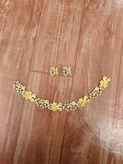 Four-Strand Faux Pearl Choker with Gold-Tone Floral Pendant