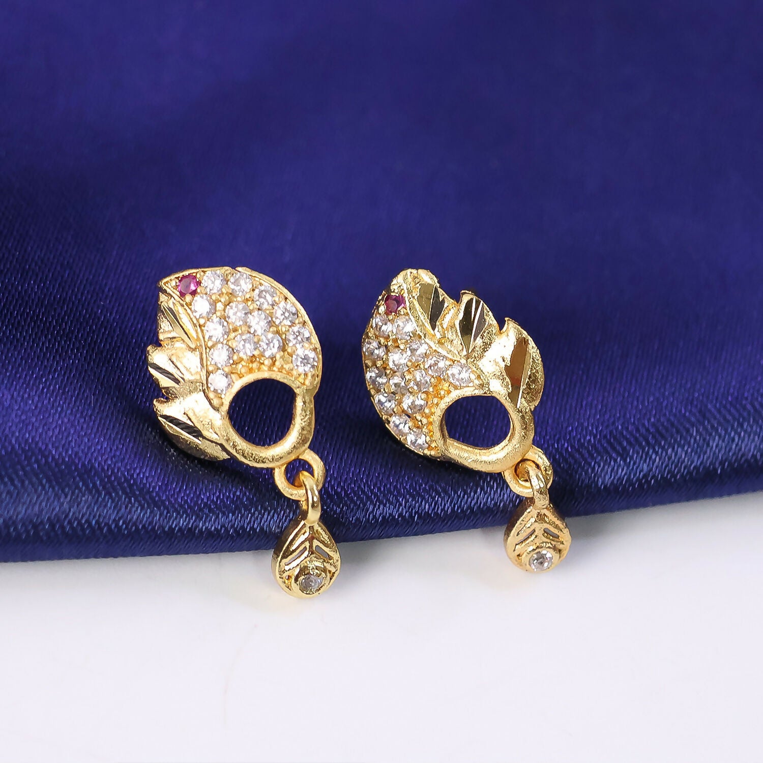 Elegant Gold Finish Leaf Pattern Stud Earrings With Sparkling Stone Drop Design