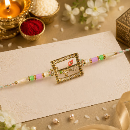 Krishna Script Pendant Rakhi with Red Flower Accent