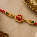 Elegant Rakhi featuring Om Plaque, crystal accents and thread style for Gift Styling