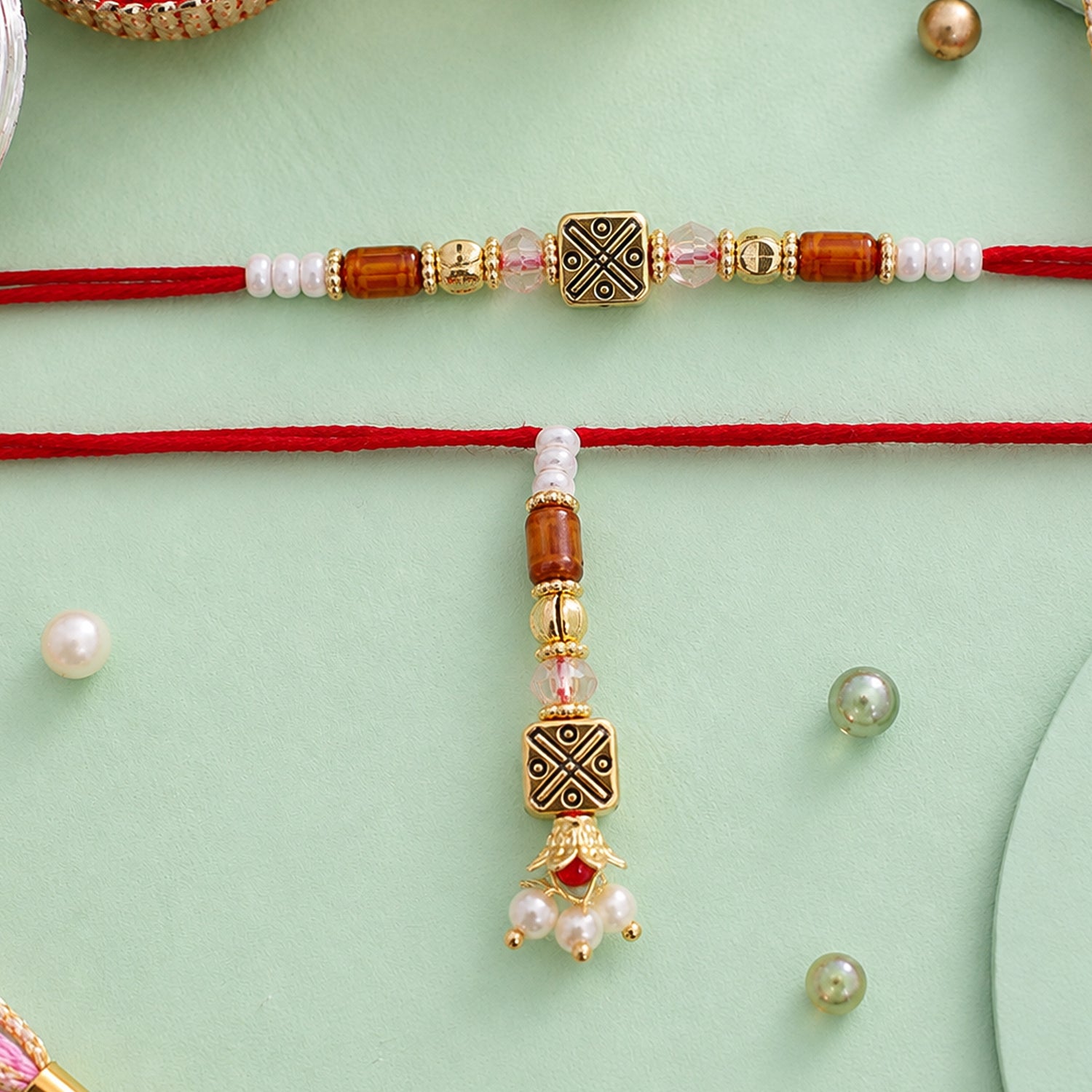 Geometric Square Couple Rakhi Set with Amber Beads and Pearl Lumba for Bhaiya Bhabhi