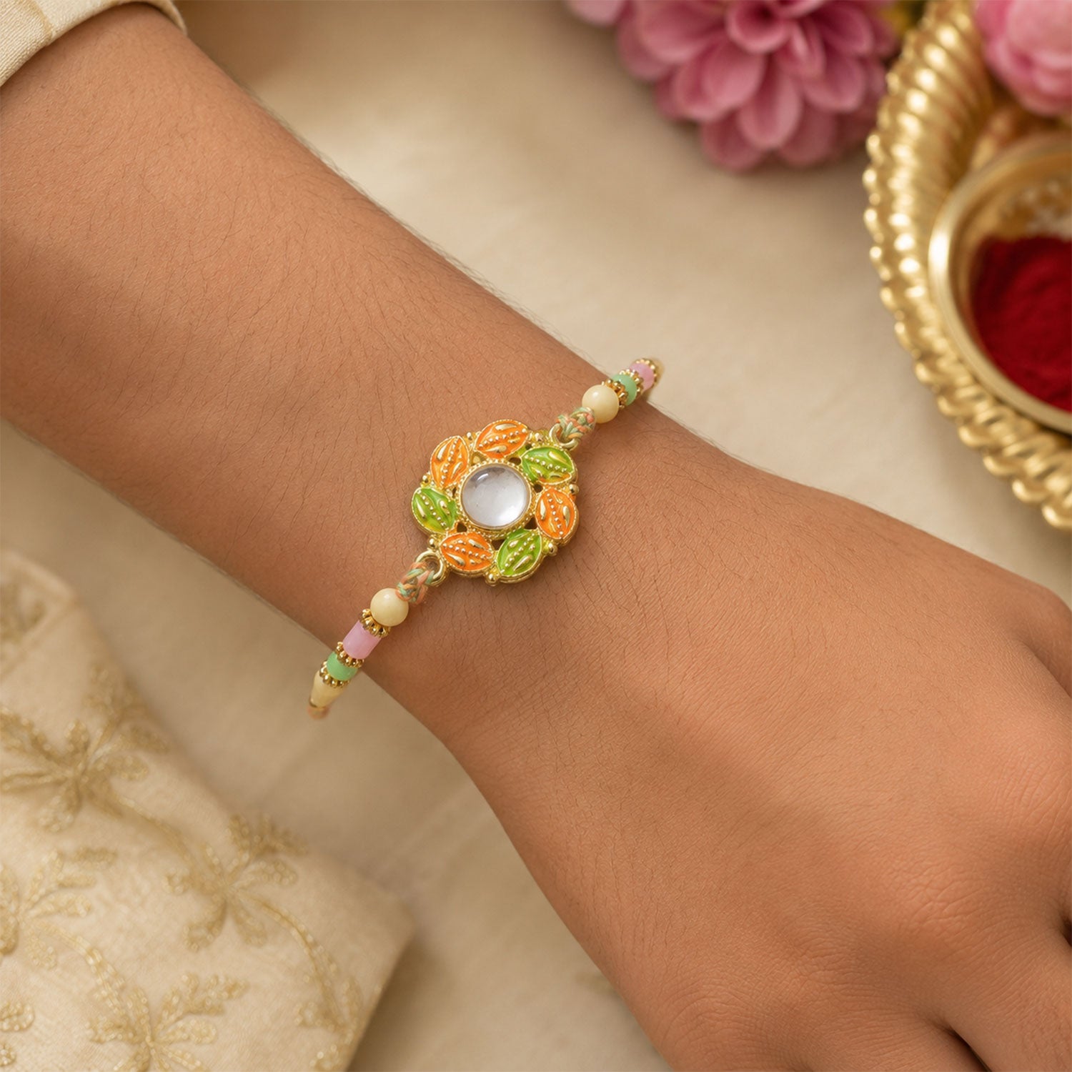 Gold Leaf Kundan Pendant Rakhi with Rudraksha Beads