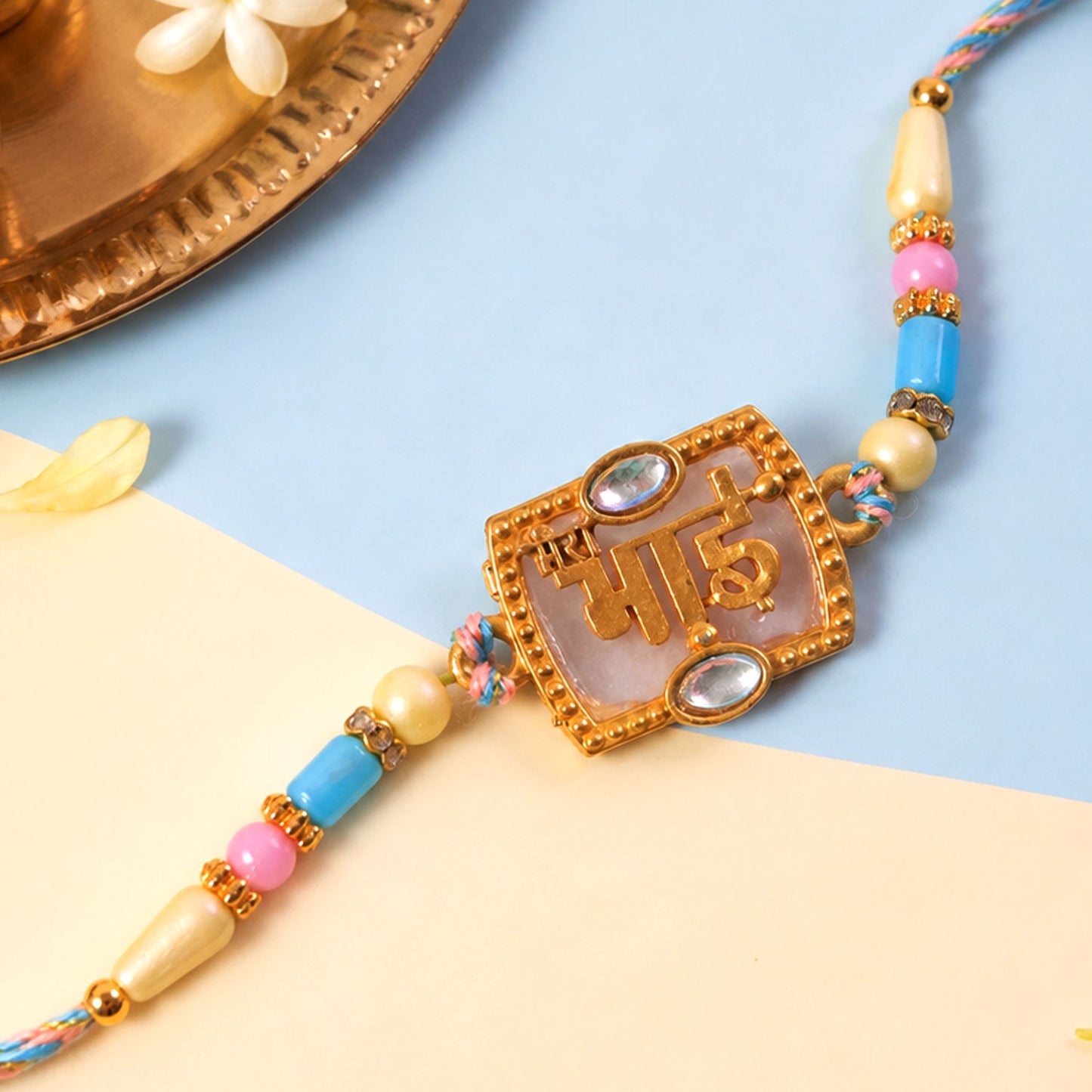 Bhai Script Pendant Rakhi with Lilac Stone and Kundan Accents