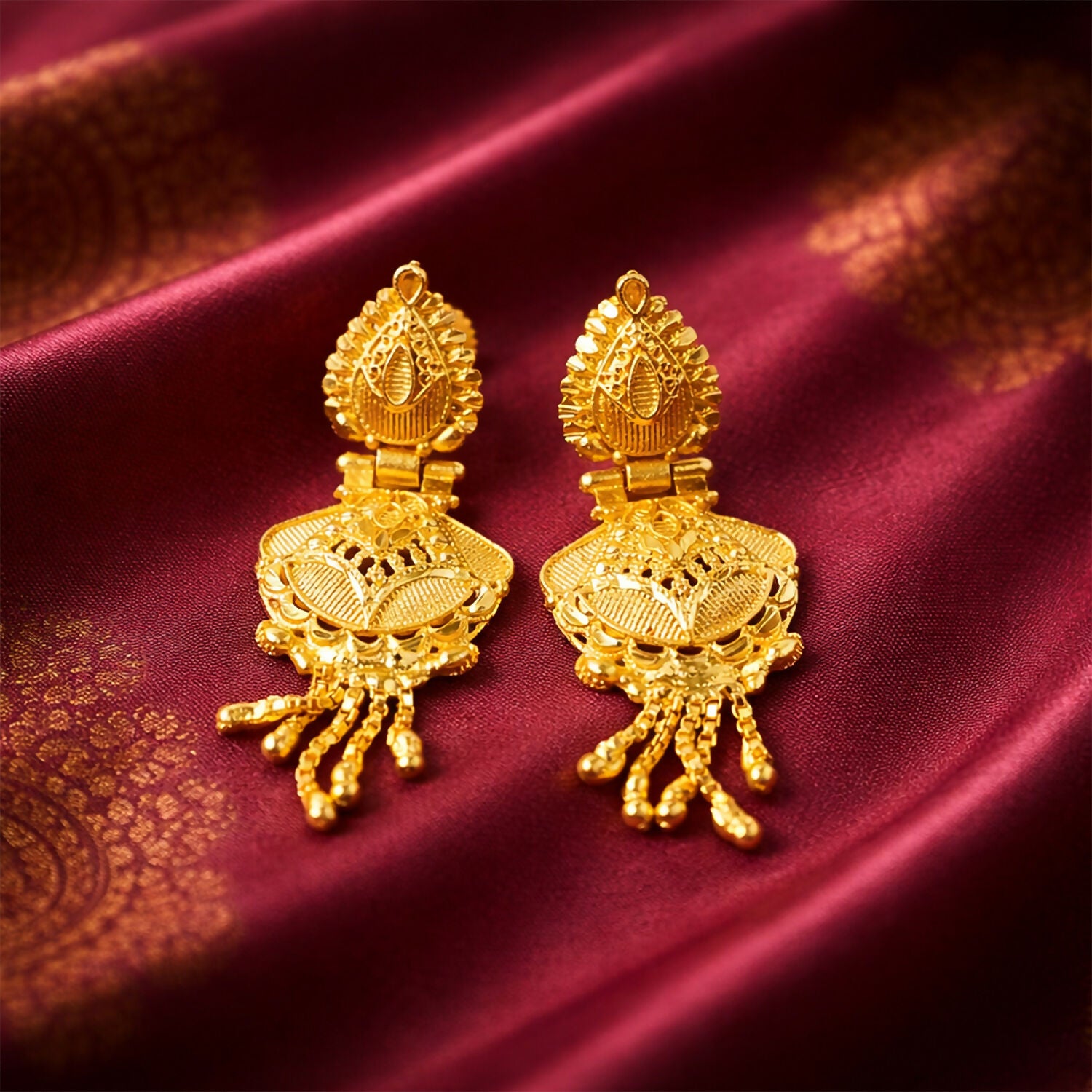 Luxurious Festive Wear Gold Dangle Earrings with Intricate Carved Design and Hanging Gold Beads