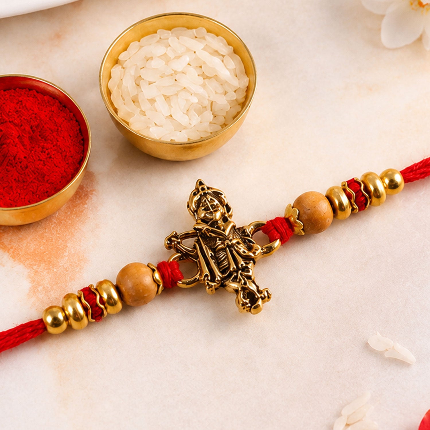 Krishna Flute Idol Devotional Rakhi with Golden Centre, Wooden Beads and Red Thread