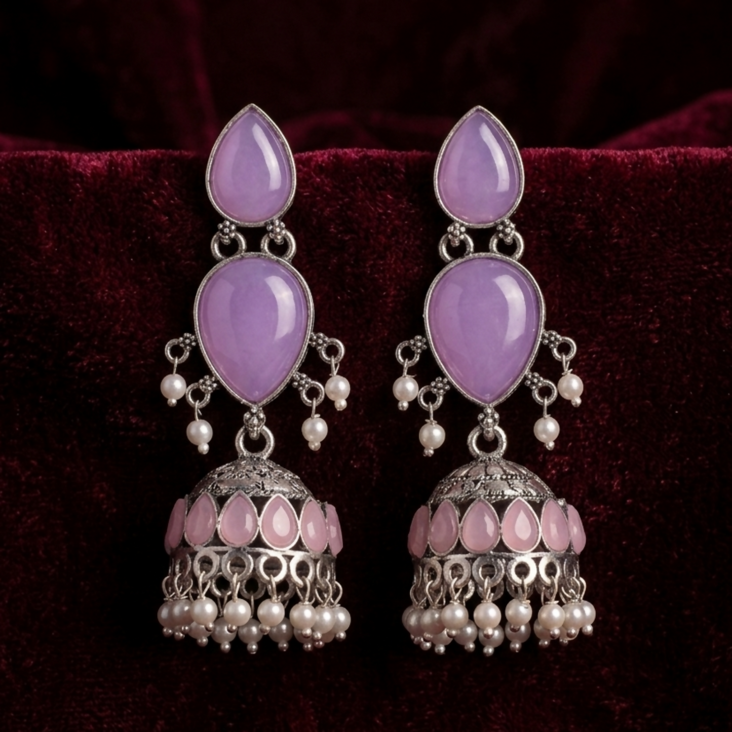 Traditional Jhumka earrings with purple stones and pearl fringe