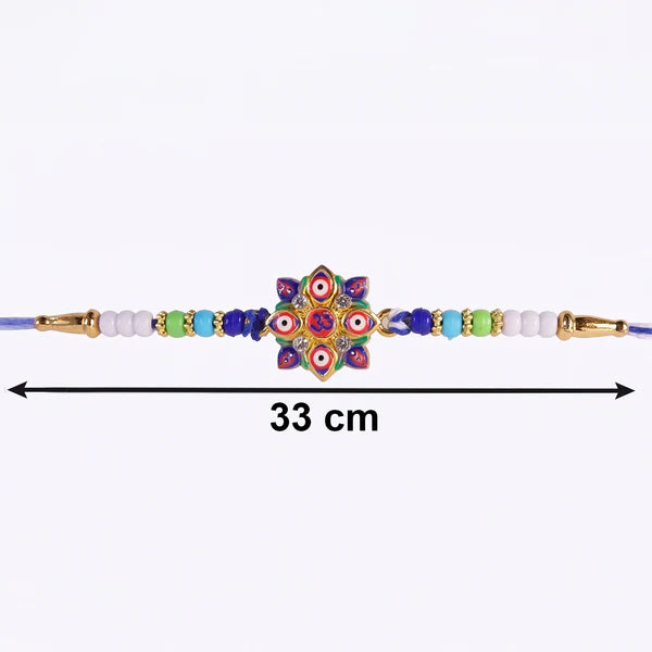 Overhead shot of the Evil Eye OM Star Rakhi highlighting its unique design.