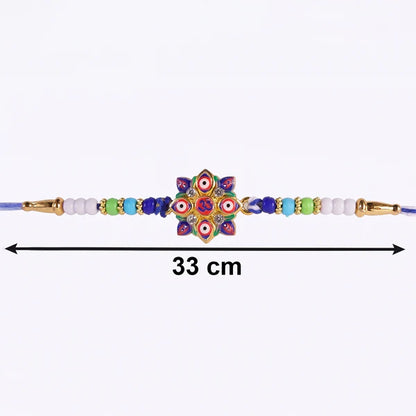 Overhead shot of the Evil Eye OM Star Rakhi highlighting its unique design.