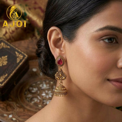 Side view of Antique Temple Gold Jhumka Earrings with floral motifs