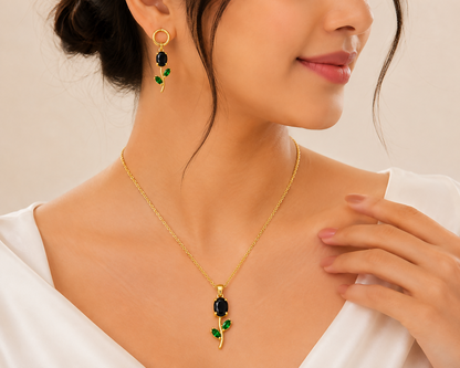 Detailed view of the matching green stone earrings from the floral necklace set.