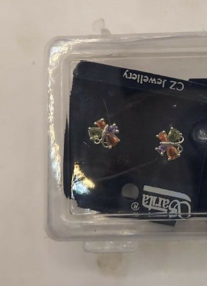 Side view of silver-plated butterfly zircon stud earrings showing secure backing for comfortable wear