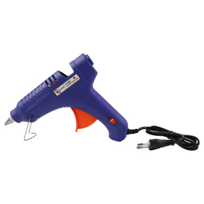 Electric hot melt glue gun resting on integrated stand