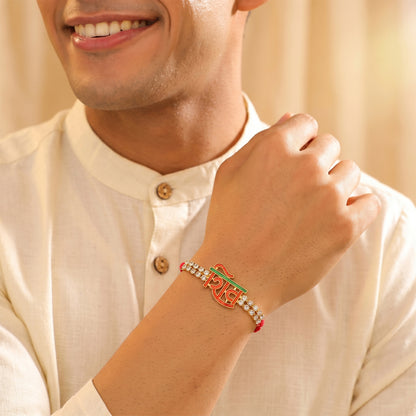 Shiv Letter Rakhi with Crystal Row and Red Mauli Thread
