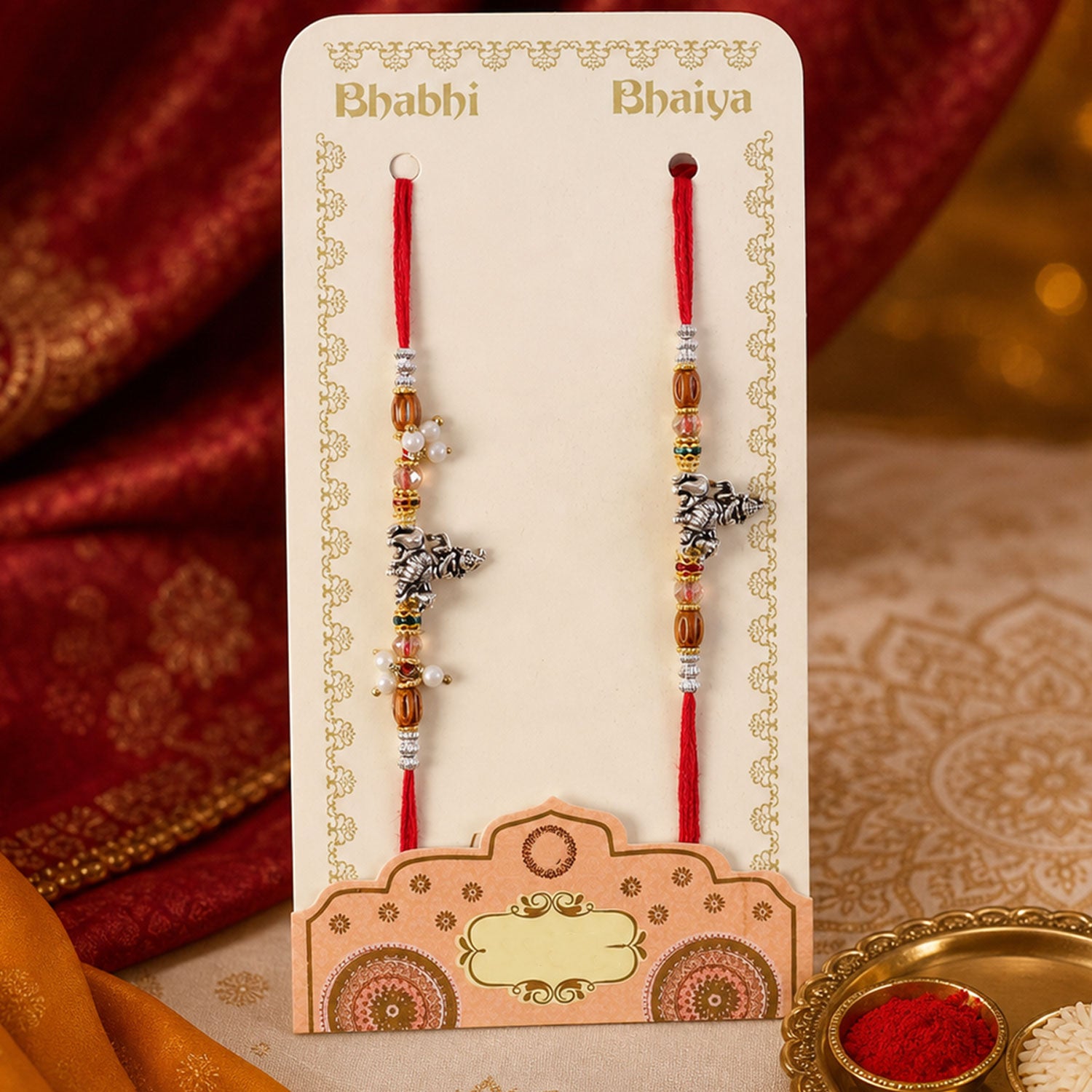 Krishna Cow Motif Bhai Bhabhi Rakhi with Beads and Pearl Drops for Raksha Bandhan