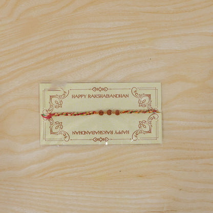 Rudraksha Style Devotional Rakhi with Braided Red Green Yellow Thread and Wooden Beads