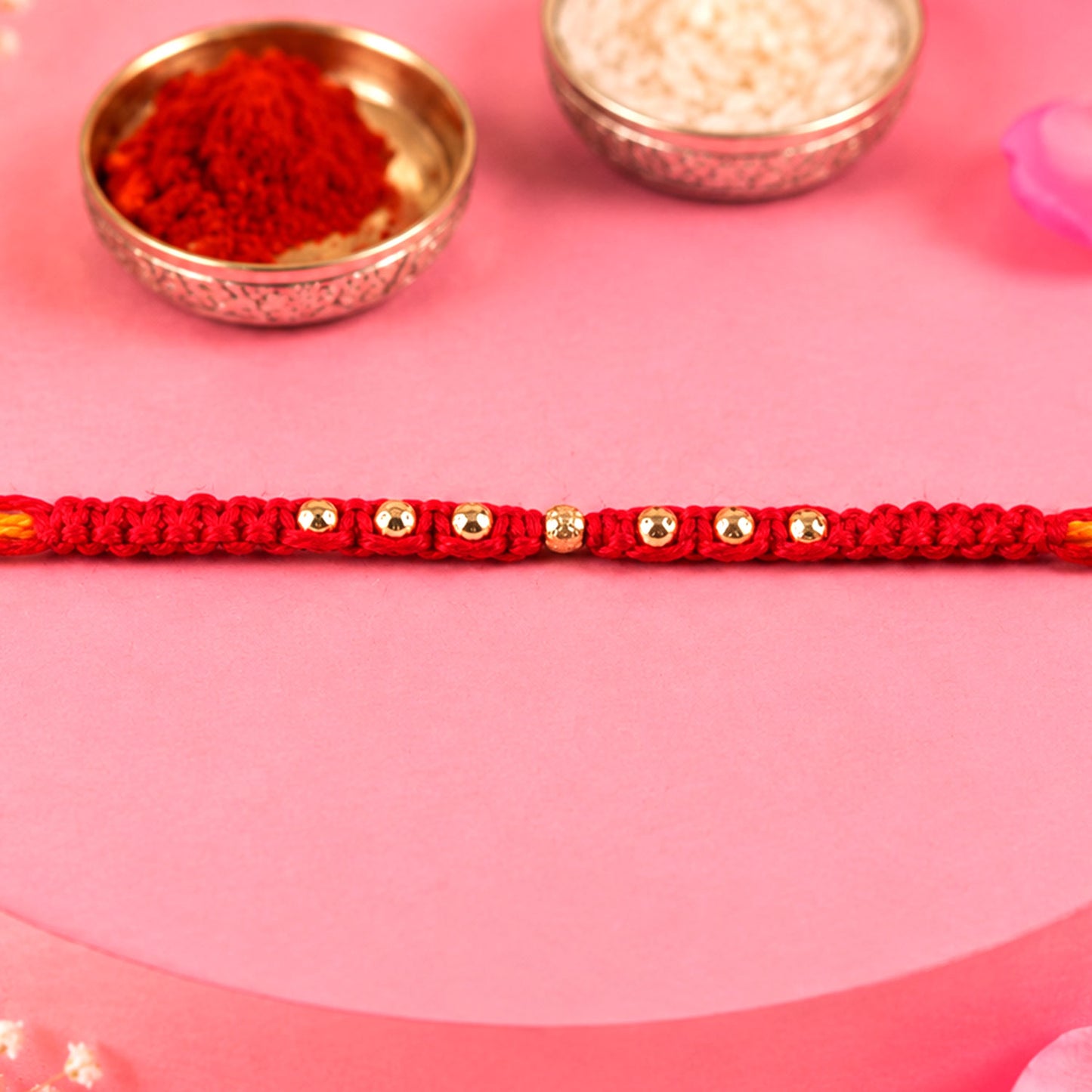 Minimal Red Stone Rakhi with Simple Beauty, Fine Beads and Festive Thread Detail