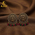Gold Lakshmi Temple Stud Earrings – Ethnic Jewelry with Ruby & Emerald Beads