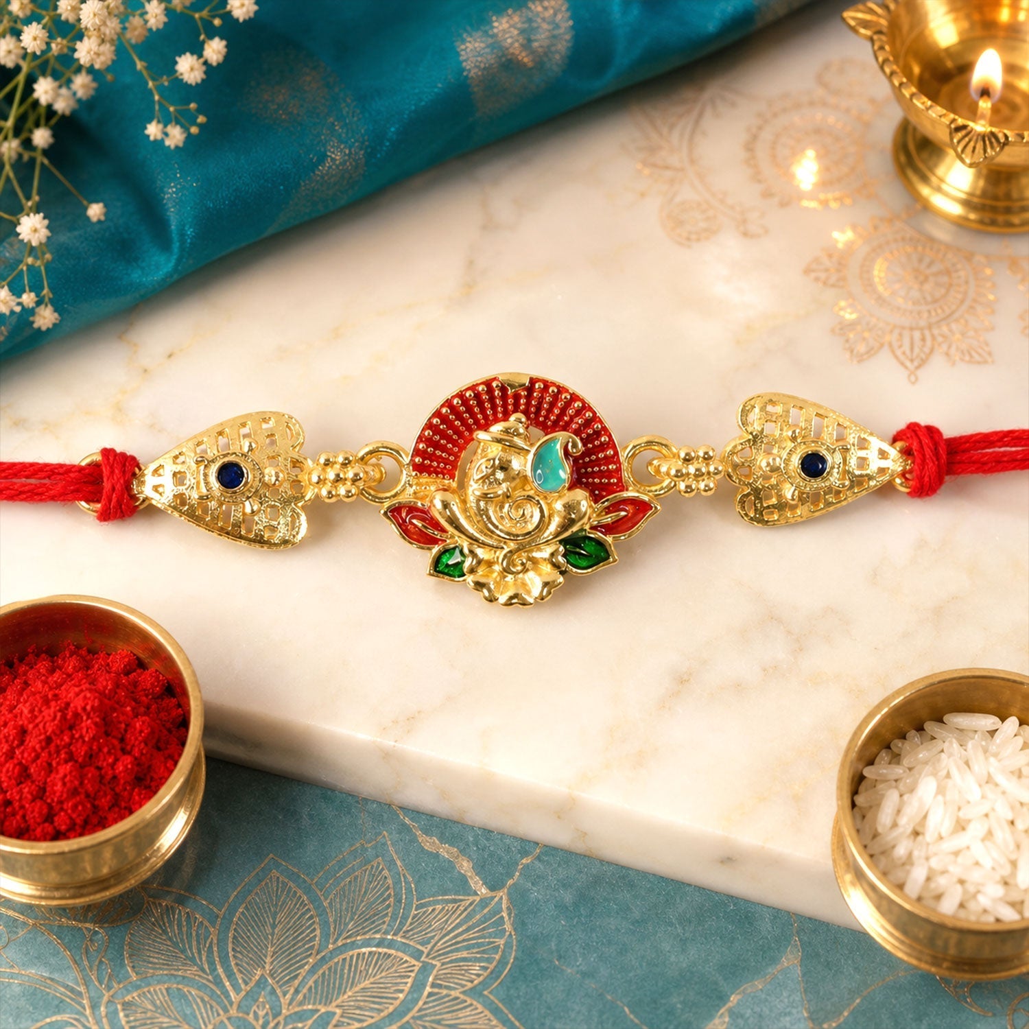 Gold-Toned Lord Ganesha Rakhi with Lotus Enamel for Raksha Bandhan (5pcs)