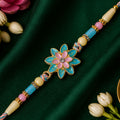 Designer Rakhi featuring Lotus Charm, bead line and gift style for Retail Display