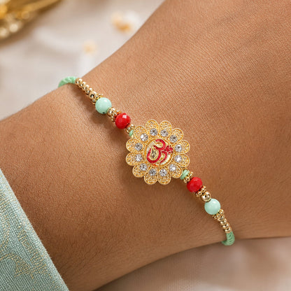 Om Floral Kundan Rakhi with Pearl Beads and Traditional Motif Design (5pcs)