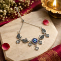 Oxidized Silver Evil Eye Peacock Charm Bracelet with Heart Dangles