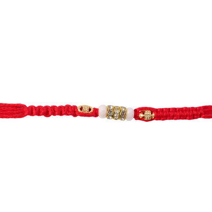 Red Braided Rakhi with White Beads and Antique Gold Accent Charms