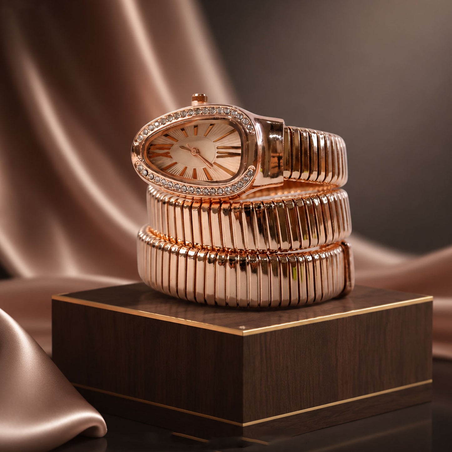 Rose Gold Oval Snake Style Bracelet Watch with Crystal Dial Border Design