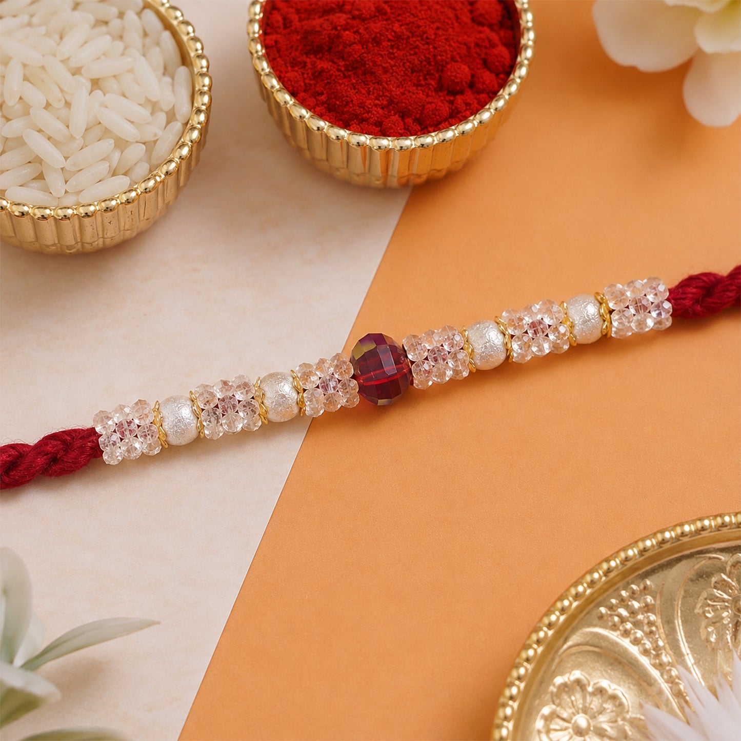 Graceful Pastel Bracelet Rakhi with Silver Centre and Delicate Raksha Bandhan Beauty