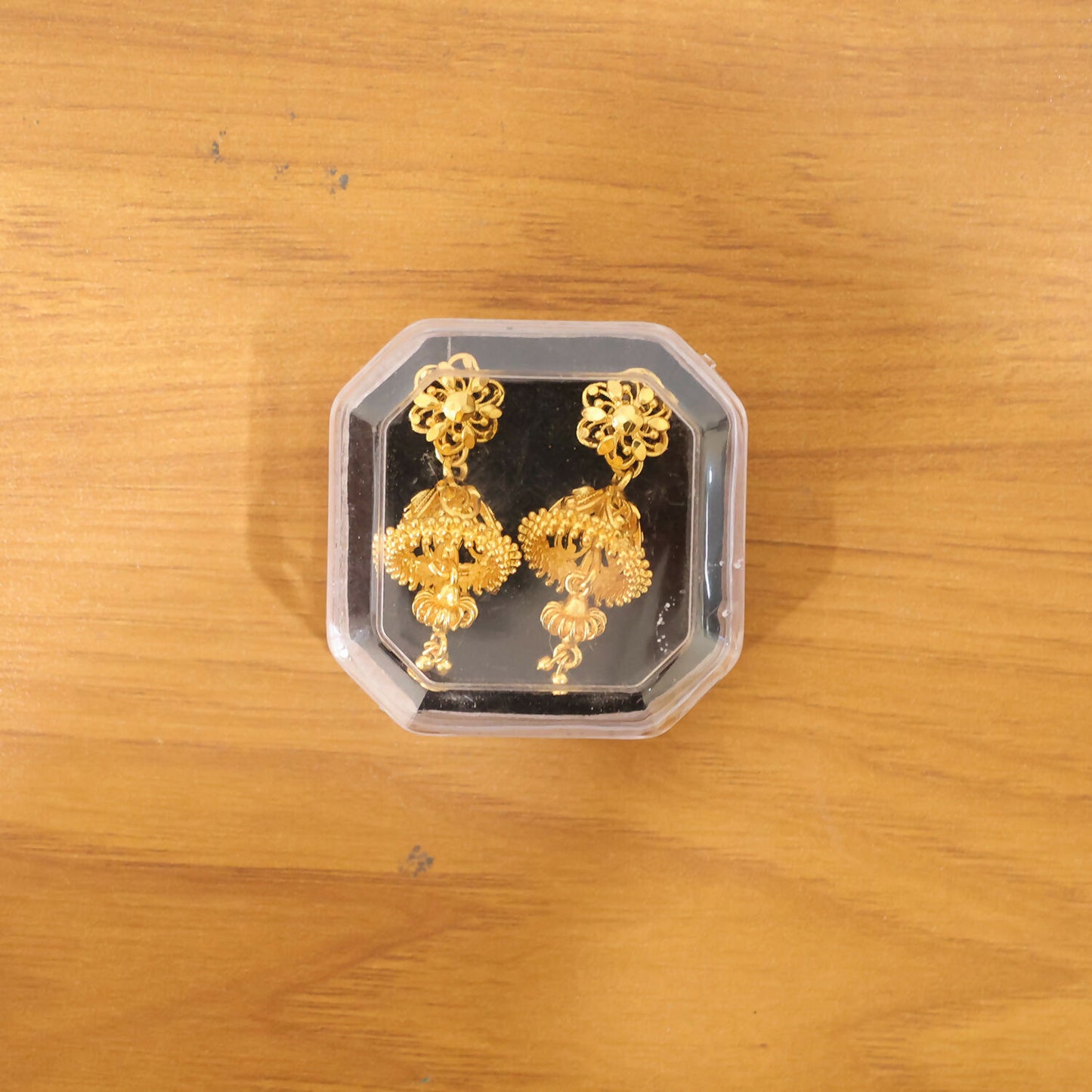 Royal Ethnic Gold Jhumka Earrings with Intricate Detailing